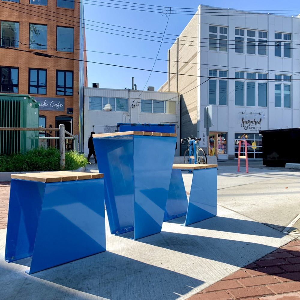 Blue geometric street furniture installed in Old Strathcona